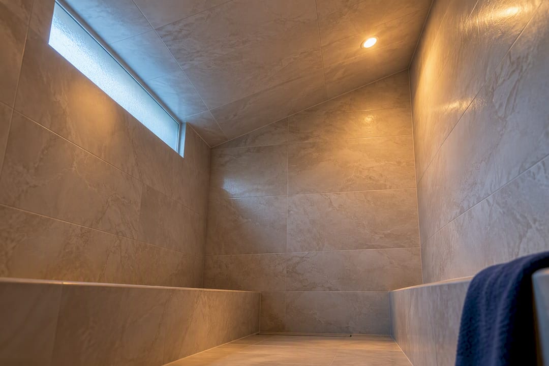 Sloped tiled steam room ceiling