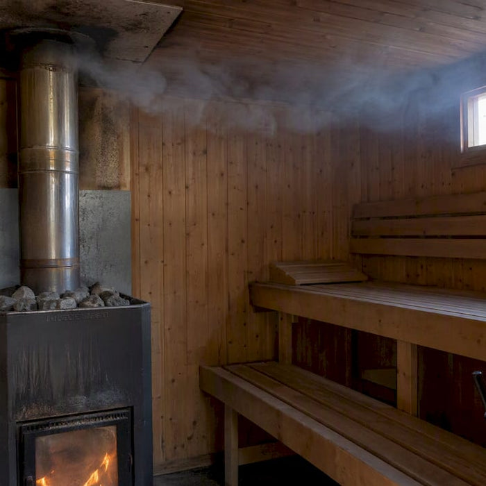 Smoke drifting from a sauna stove